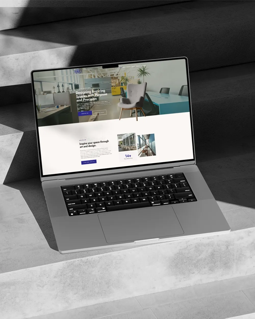 Creative Eden homepage on a laptop