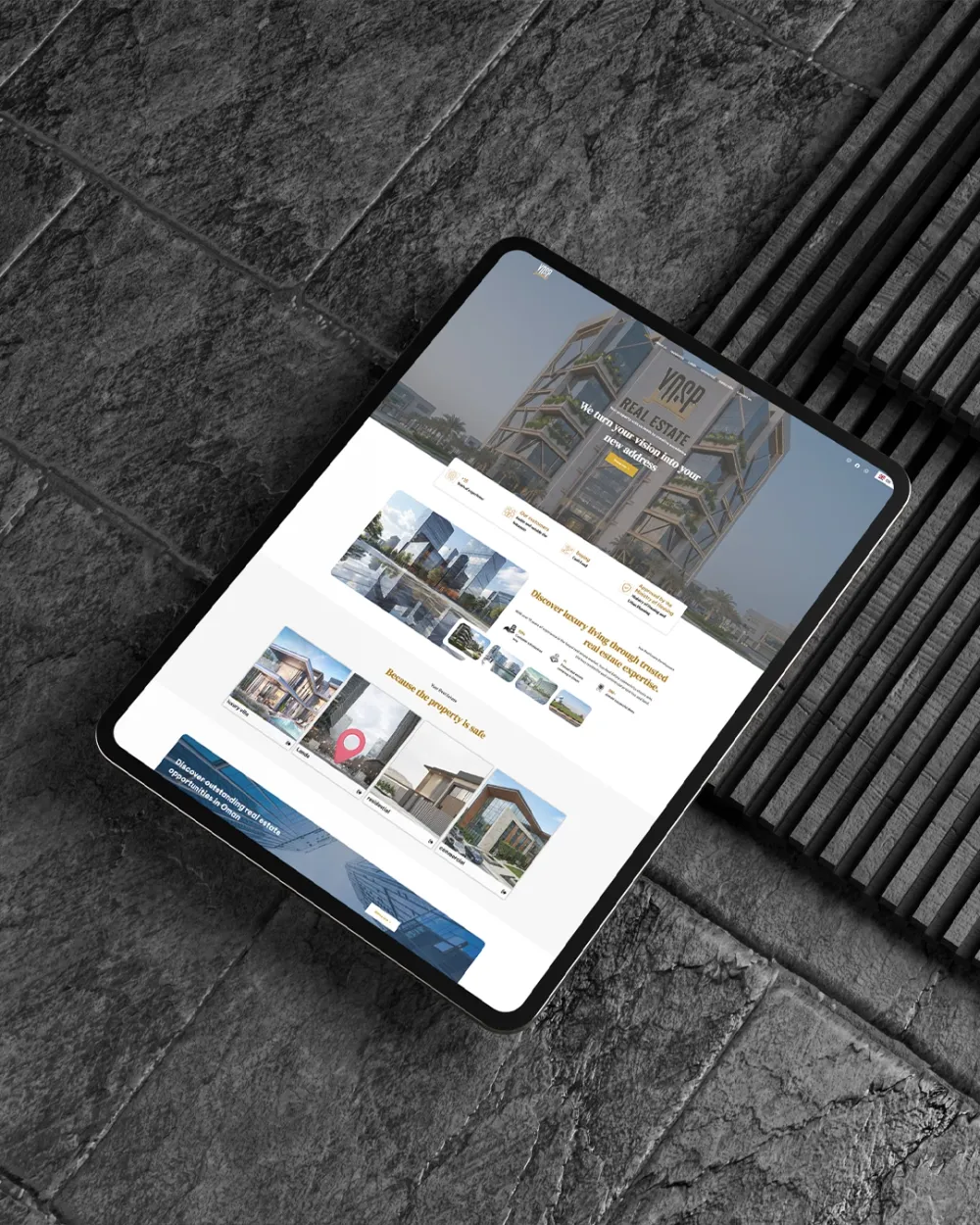 Yosr Real Estate property listings on a tablet