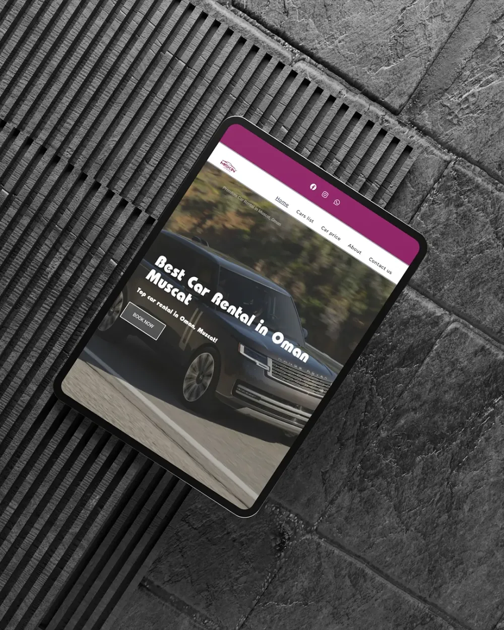 Miskin Car Rental website on a tablet