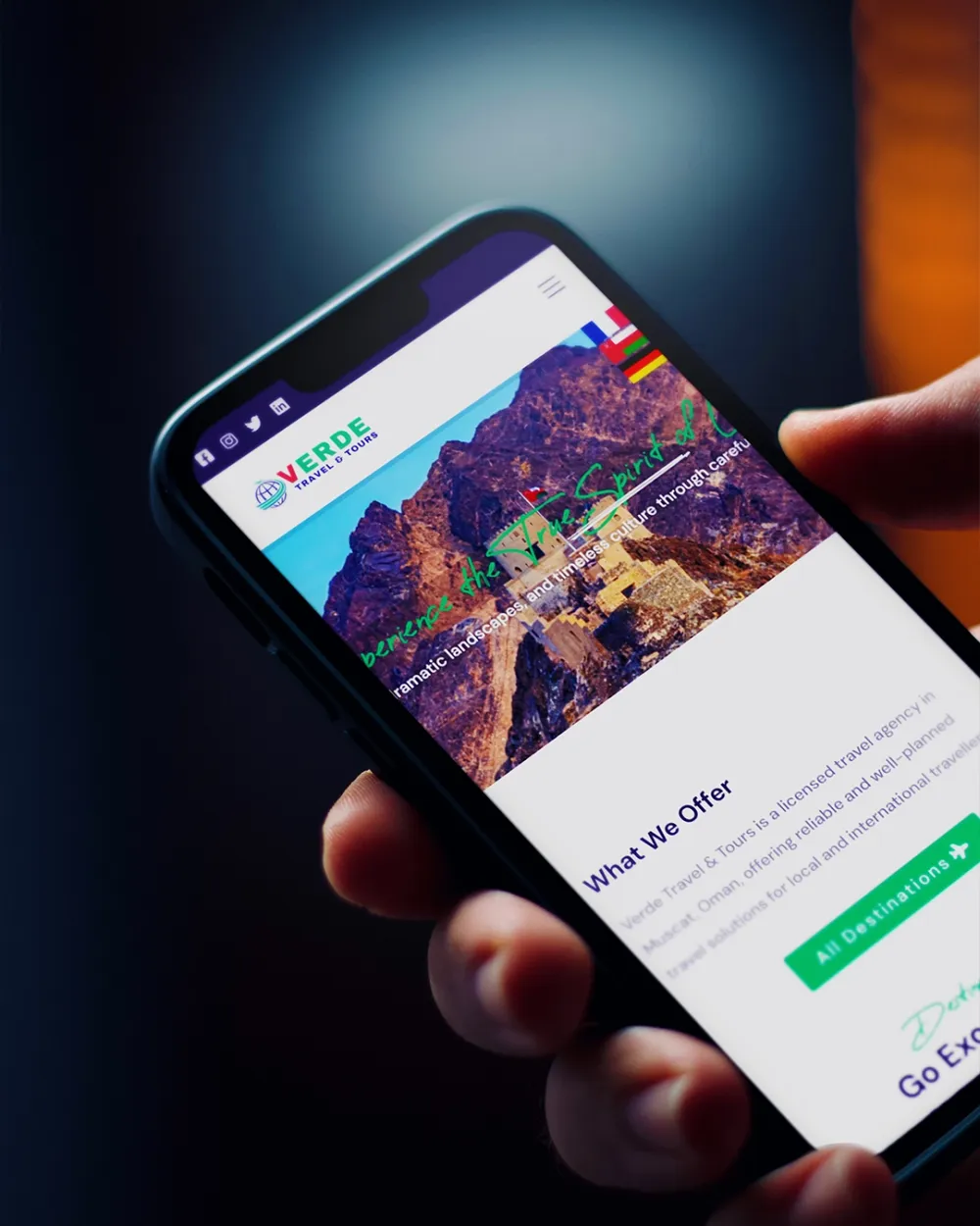Verde Travel and Tours website in a hand held phone